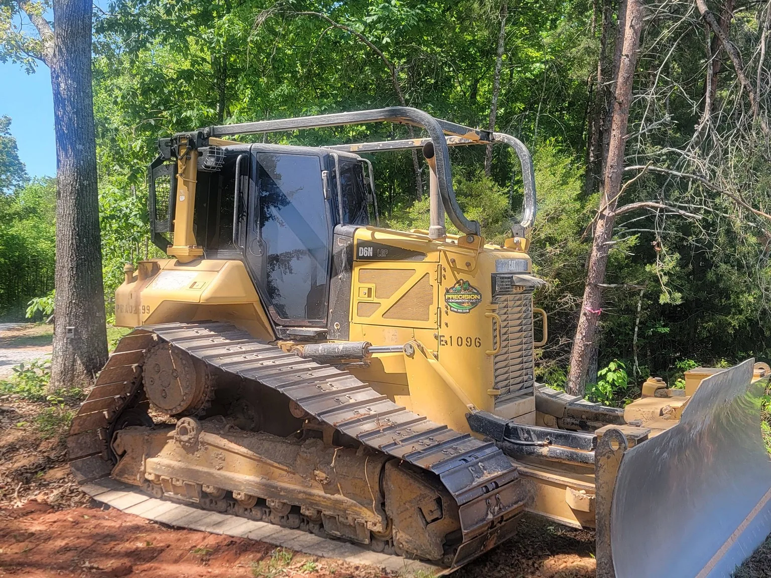 Dozer on a long driveway job, ditched and put on a continuous grade