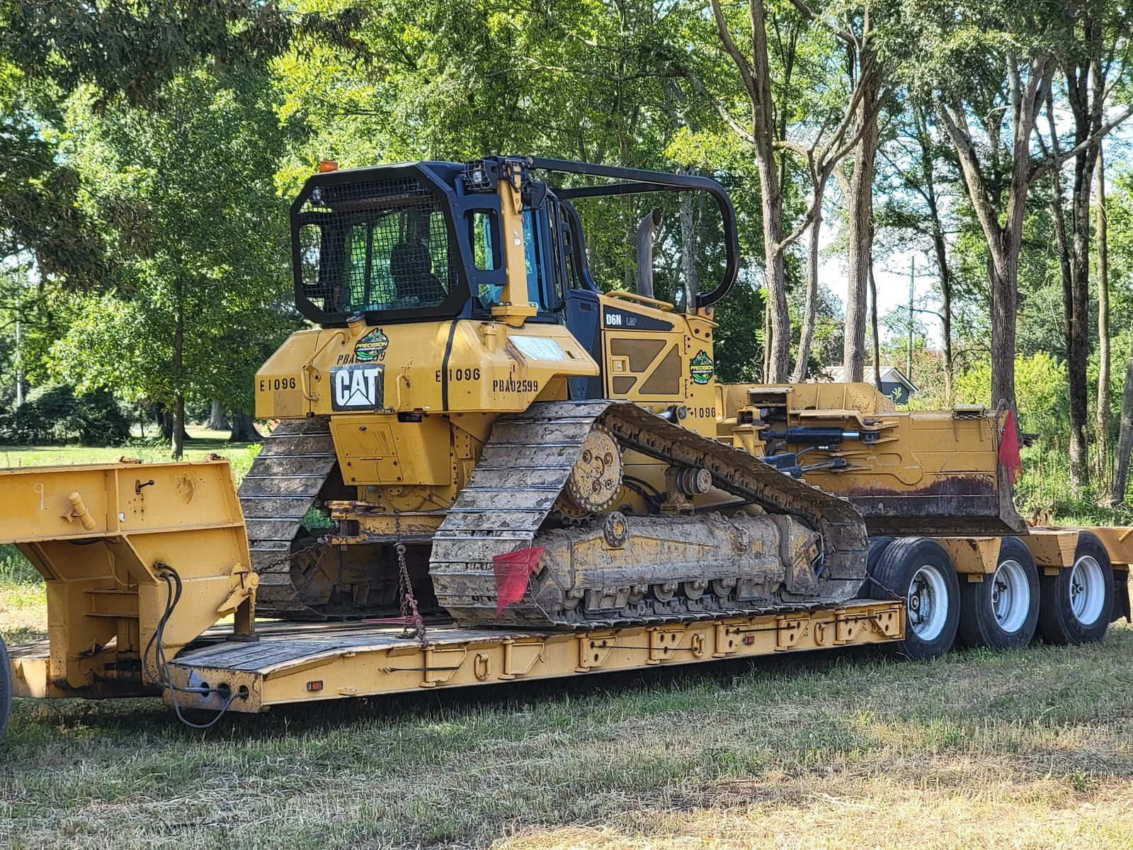 Dozer on the lowboy headed to a driveway job