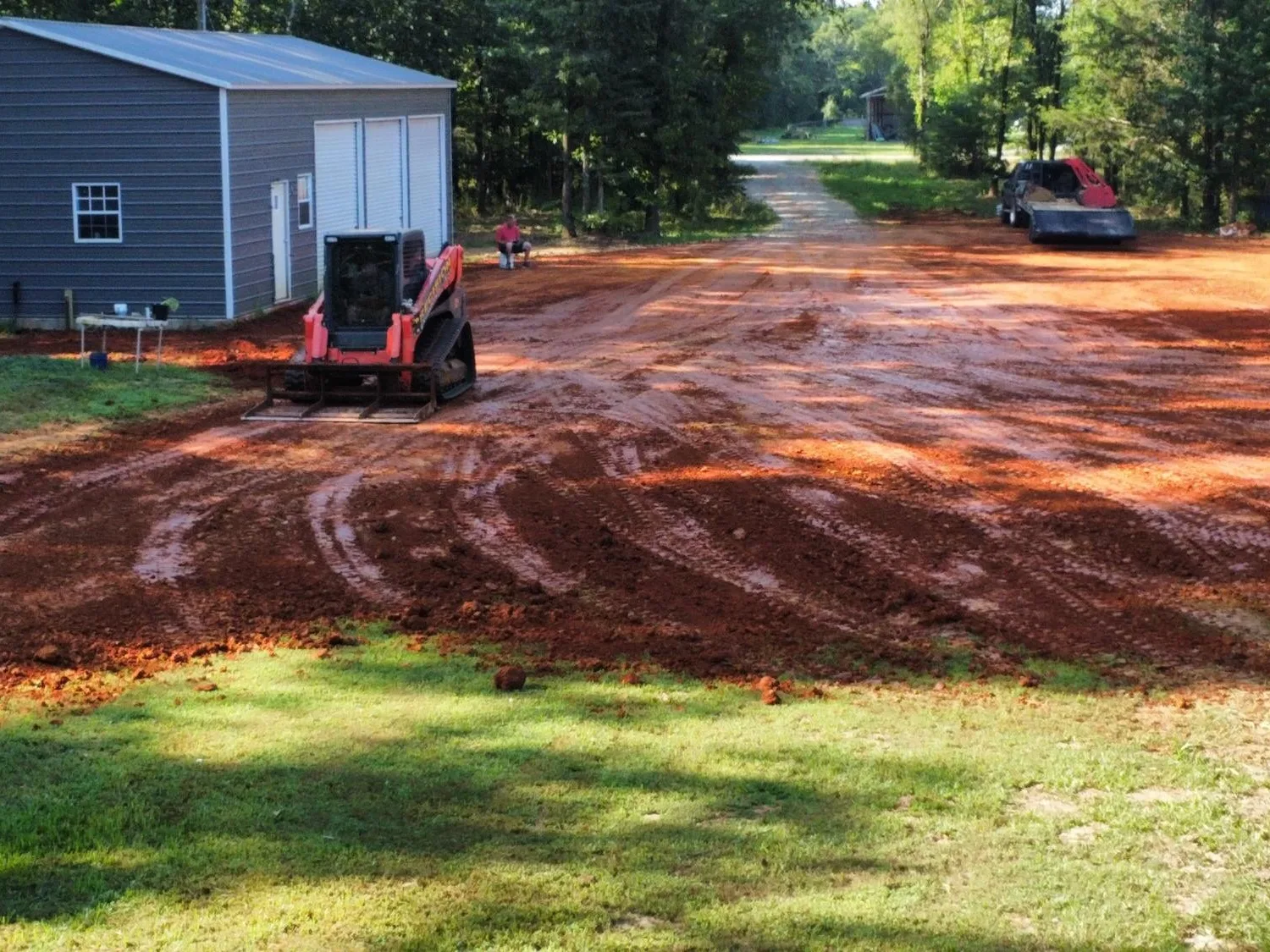 Drone view of clean grade lines on a new pad