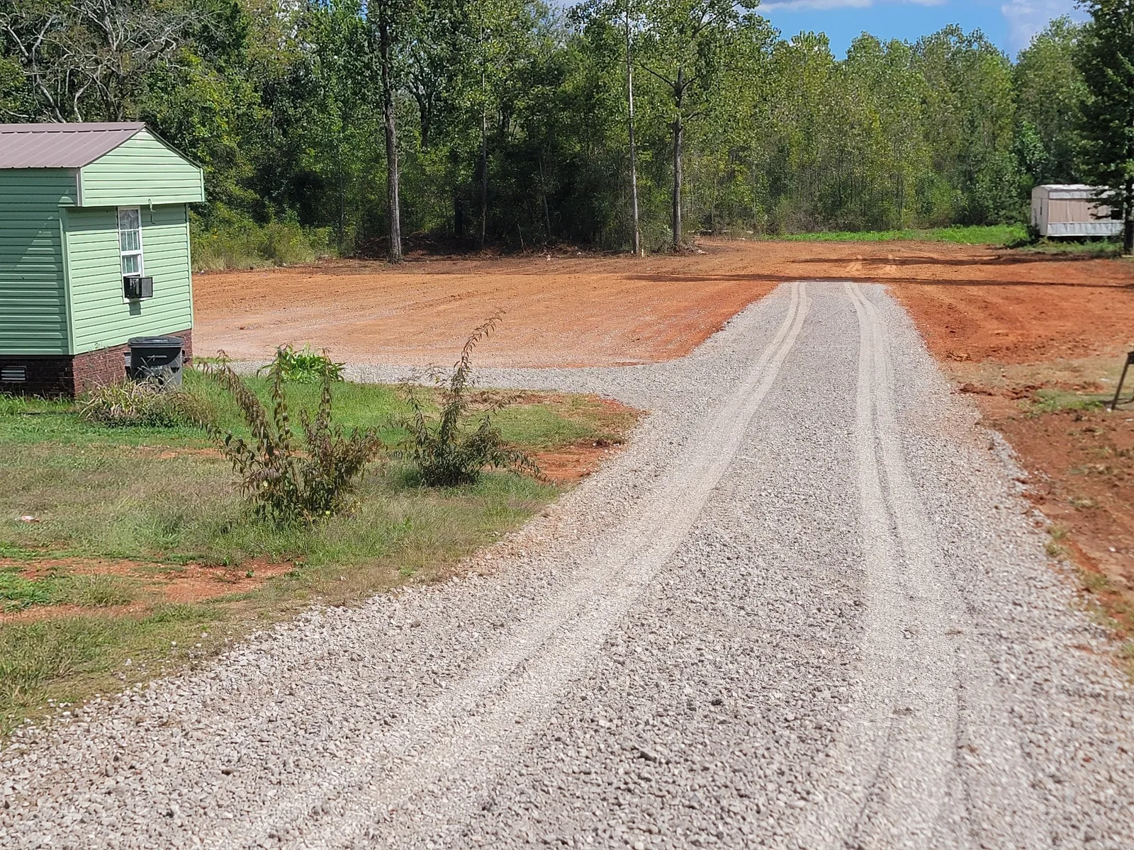 New gravel driveway and pad at a home site